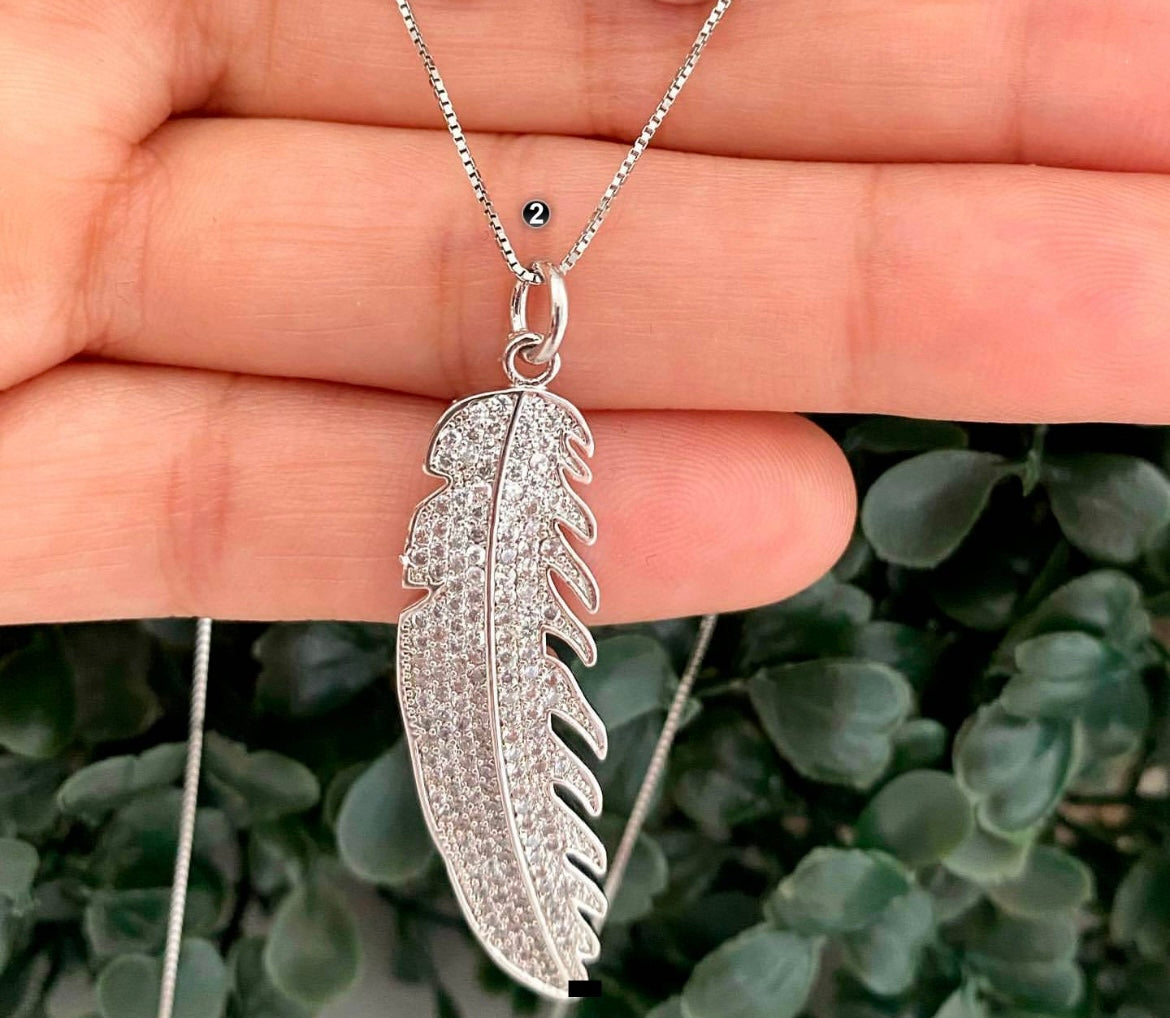 Feather charm necklace